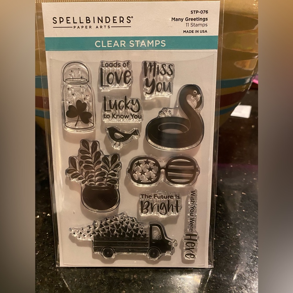 New in package. Spellbinders Many Greetings Clear Stamp set.